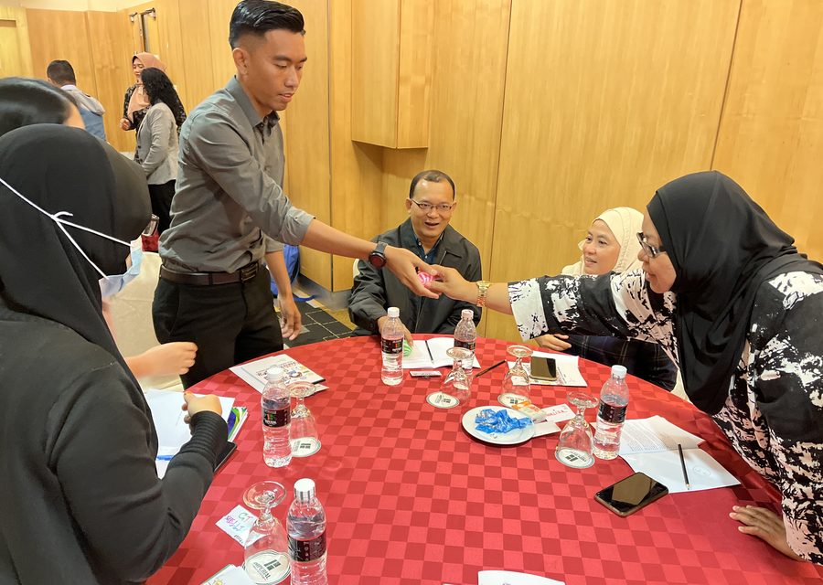 Participants in a WRK customer service workshop activity